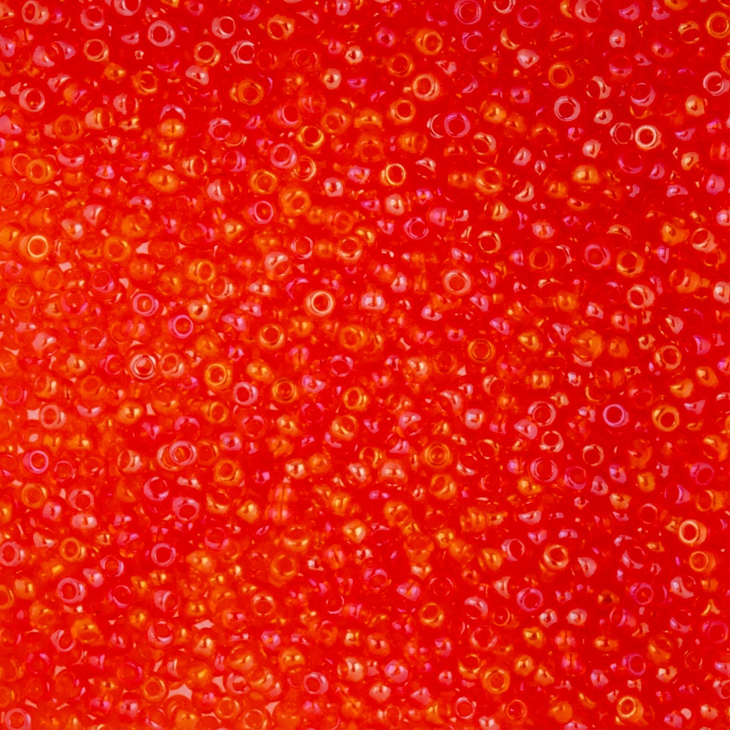 Czech Seed Beads apx. 22g Vial 10/0 Transparent Iris Orange (25)