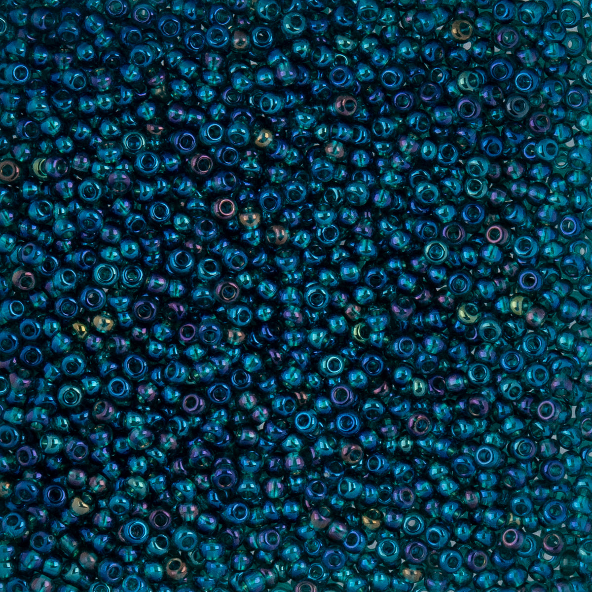 Czech Seed Beads apx. 22g Vial 10/0 Transparent Iris Green (62)