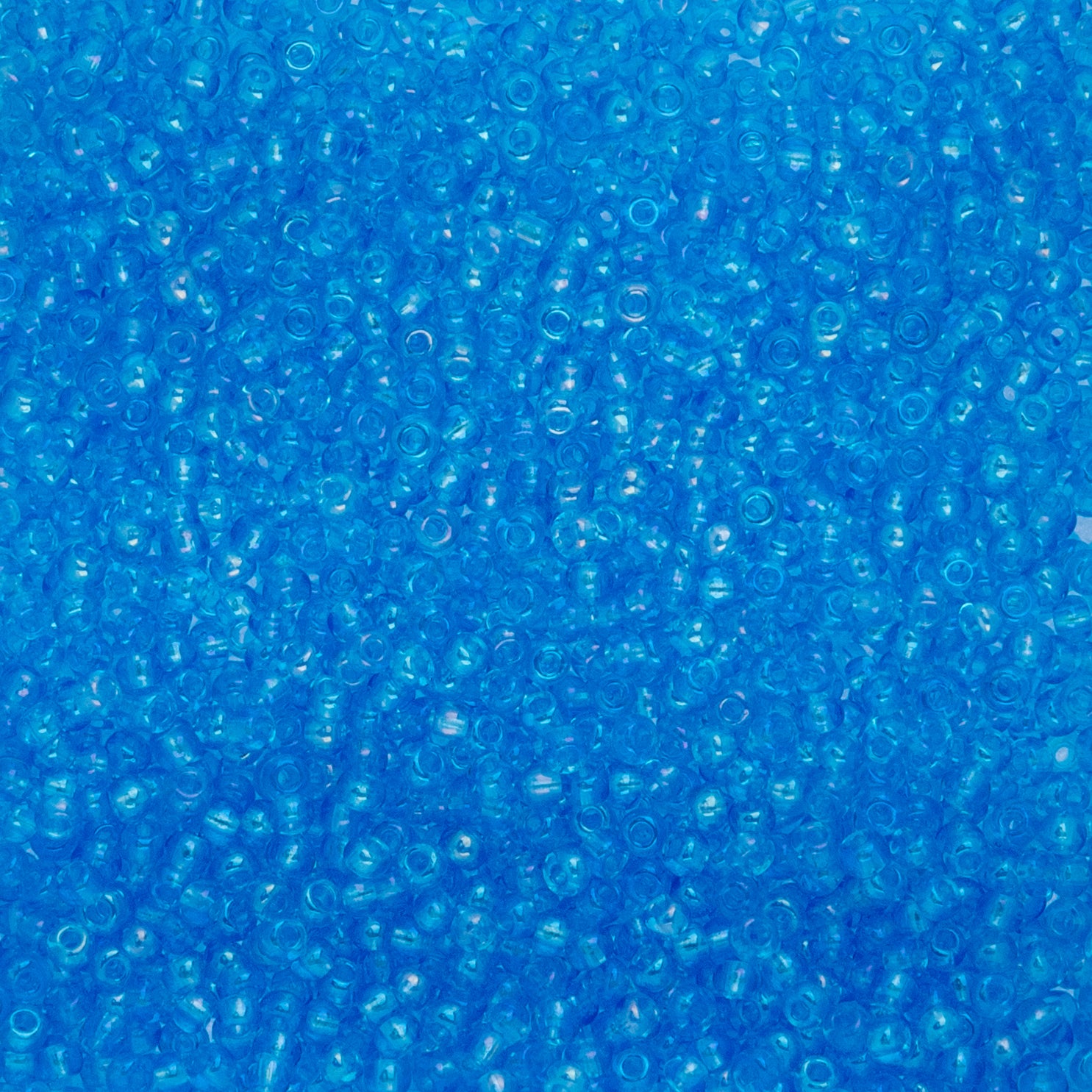 Czech Seed Beads apx. 22g Vial 10/0 Transparent Iris Aqua (70)